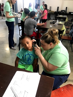 SON Student McDannald with Costa Rica patient.