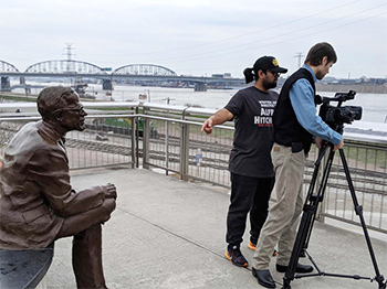 Project participants conduct a photoshoot in East St. Louis. (Photo courtesy Elizabeth Donald)