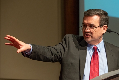 SIUE international studies program director introduces a panel of experts during International Studies Day.