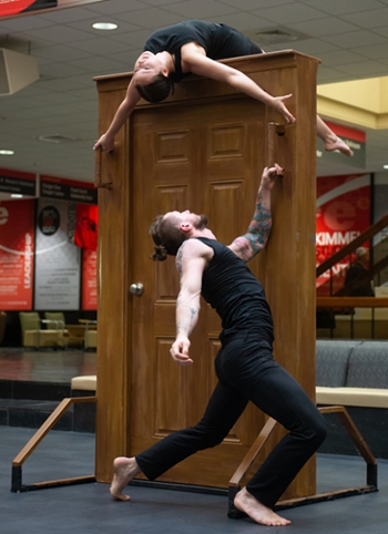 Senior dance majors Kristen Ahring and Btian Lynch perform “Knockturn” during the Undergraduate Scholars Showcase at SIUE.