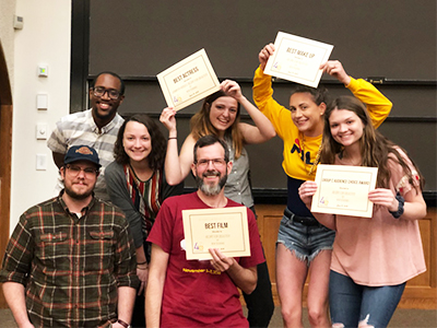 Celebrating their 48 Hour Film Project success were team members (front L-R) Eric Peterson and Cory Byers, and (back L-R) Michael Watkins, Monica Buschor, Kiara Laack, Ashley Mitchell and Emily Rork.