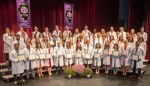 The SIU School of Dental Medicine’s 20th annual White Coat Ceremony celebrated 50 second-year dental students and six International Advanced Placement Program students.