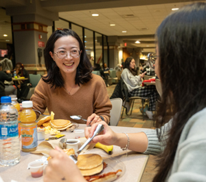 Students enjoy a delicious late-night breakfast.
