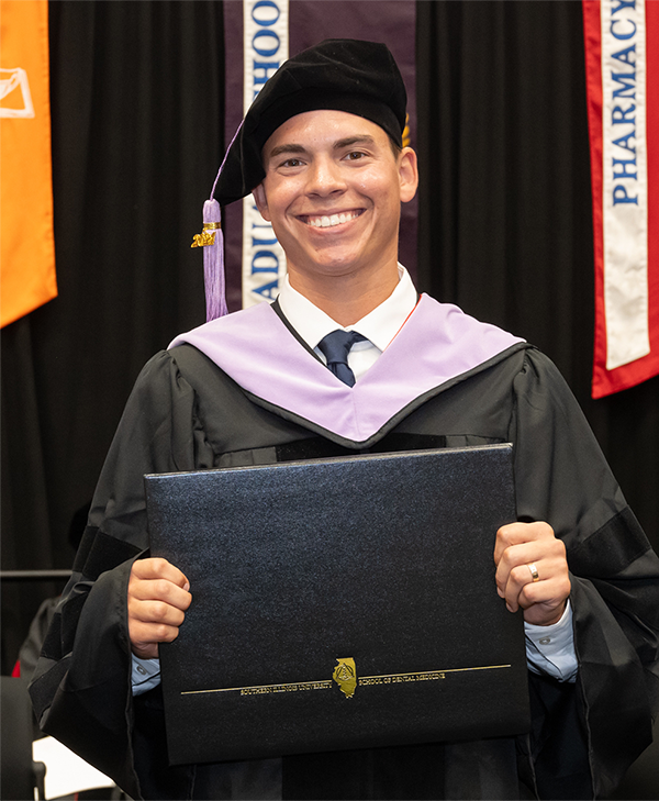 Kedric Norwood holds diploma
